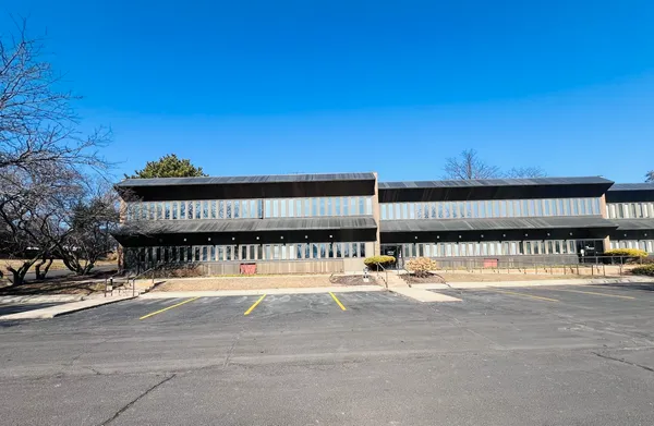 a view of a building with a street