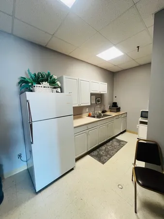 a room with furniture and window