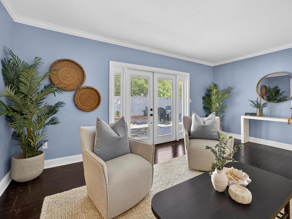 333 Cornwall Road Winter Park, FL 32792 - Photo 11 of 32 a living room with furniture potted plant and a window