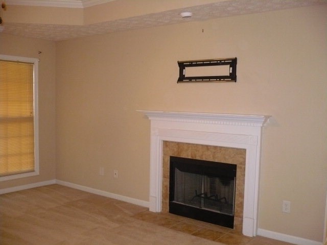 8031 Santee Court Columbus, GA 31909 - Photo 3 of 9 a view of a livingroom with a fireplace