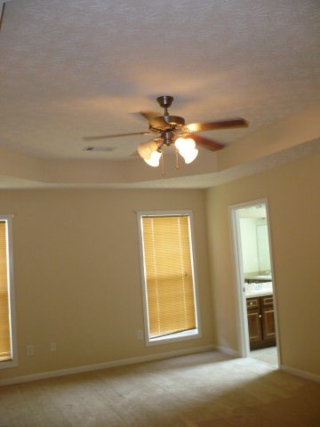 8031 Santee Court Columbus, GA 31909 - Photo 7 of 9 a view of a livingroom with a chandelier