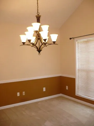 a view of a room with a fan