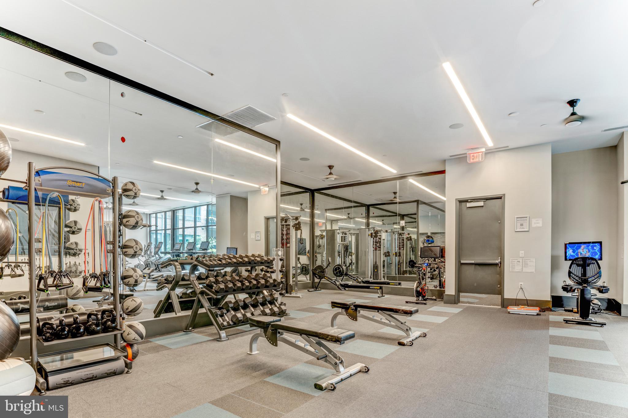 1761 Old Meadow Road, Unit 209 McLean, VA 22102 - Photo 47 of 49 a view of a room with gym equipment