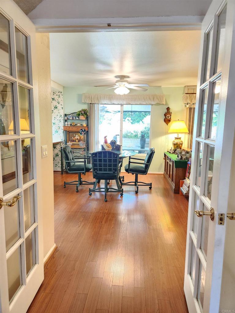 1722 Firestone Drive Escondido, CA 92026 - Photo 24 of 72 a living room with furniture and a wooden floor