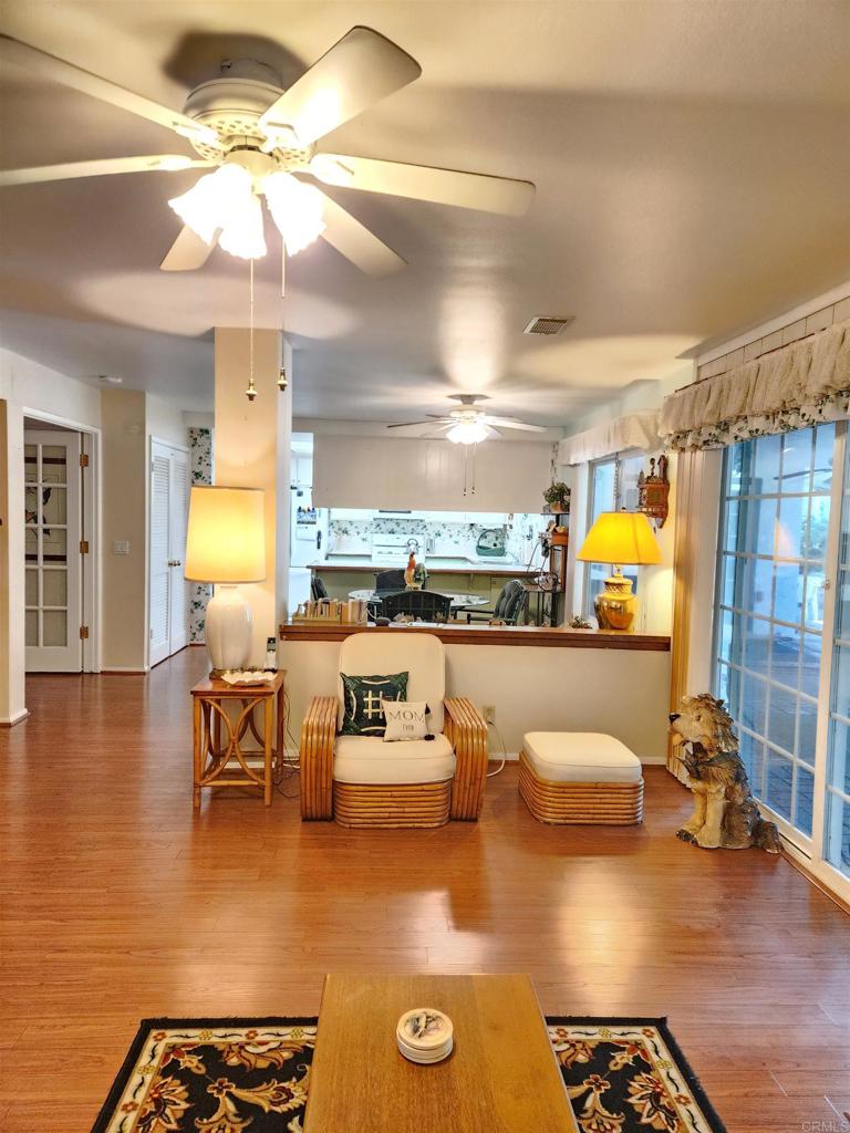 1722 Firestone Drive Escondido, CA 92026 - Photo 26 of 72 a living room with furniture and a large window