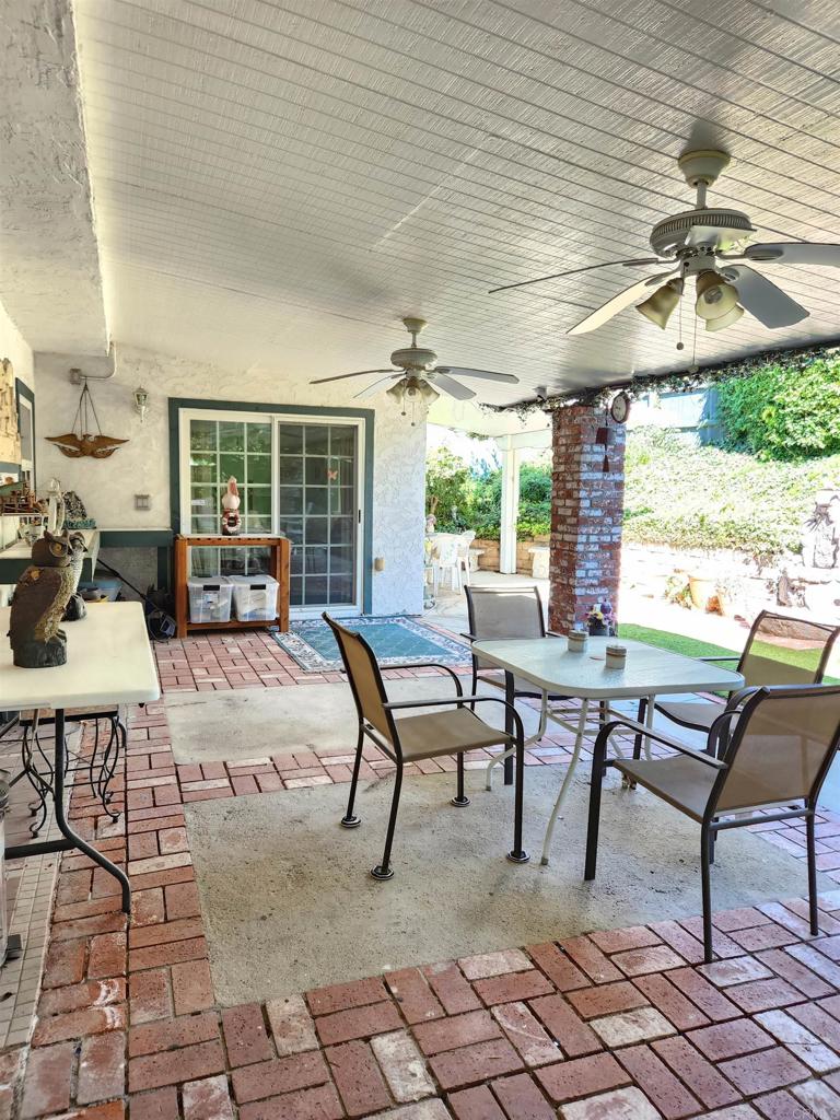 1722 Firestone Drive Escondido, CA 92026 - Photo 43 of 72 a building outdoor space with patio furniture and potted plants