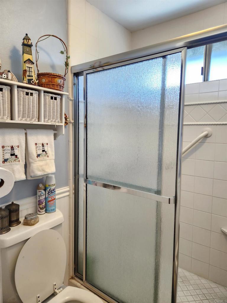 1722 Firestone Drive Escondido, CA 92026 - Photo 53 of 72 a bathroom with a sink a toilet and a shower