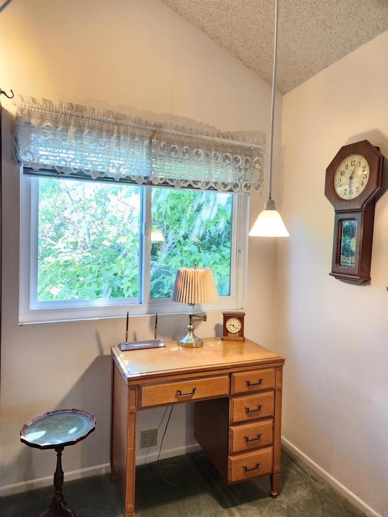 1722 Firestone Drive Escondido, CA 92026 - Photo 65 of 72 a view of a workspace with a window and sitting area