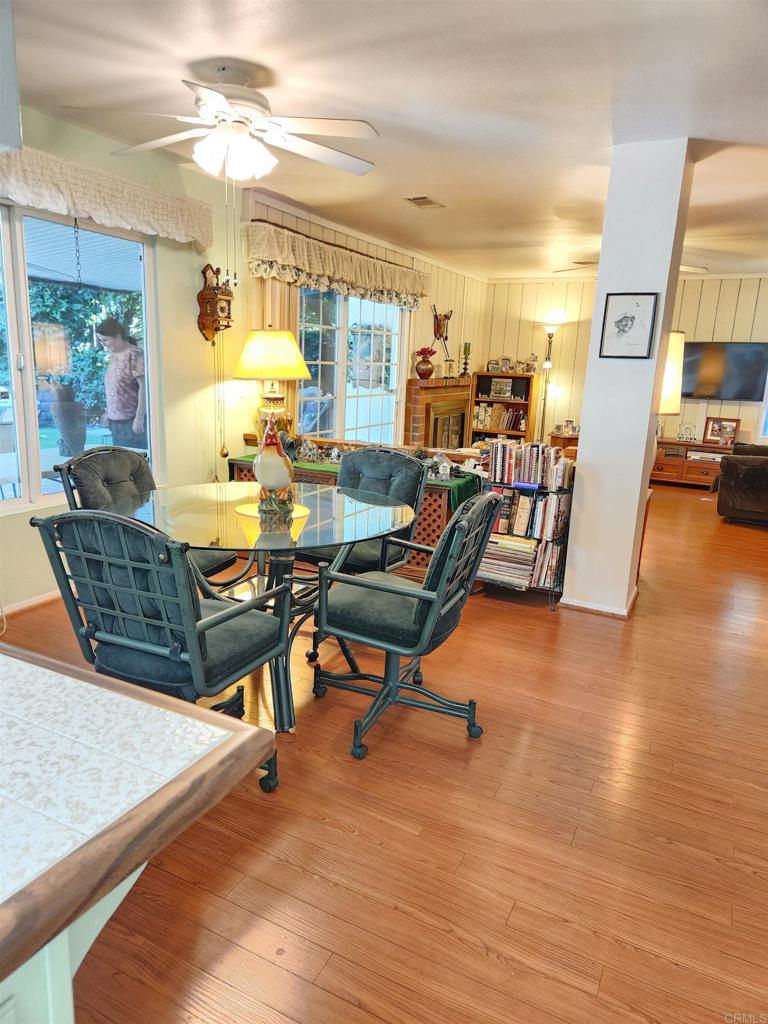 1722 Firestone Drive Escondido, CA 92026 - Photo 7 of 72 a living room with furniture and a wooden floor