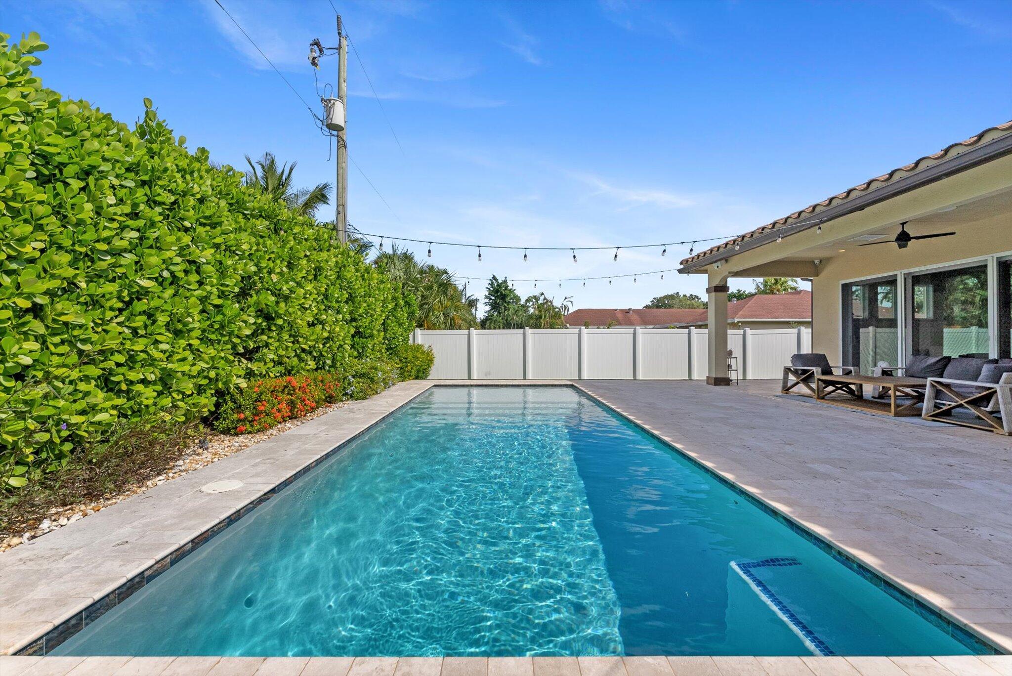 1301 Southwest 15th Street Boca Raton, FL 33486 - Photo 19 of 54 a view of a backyard of the house