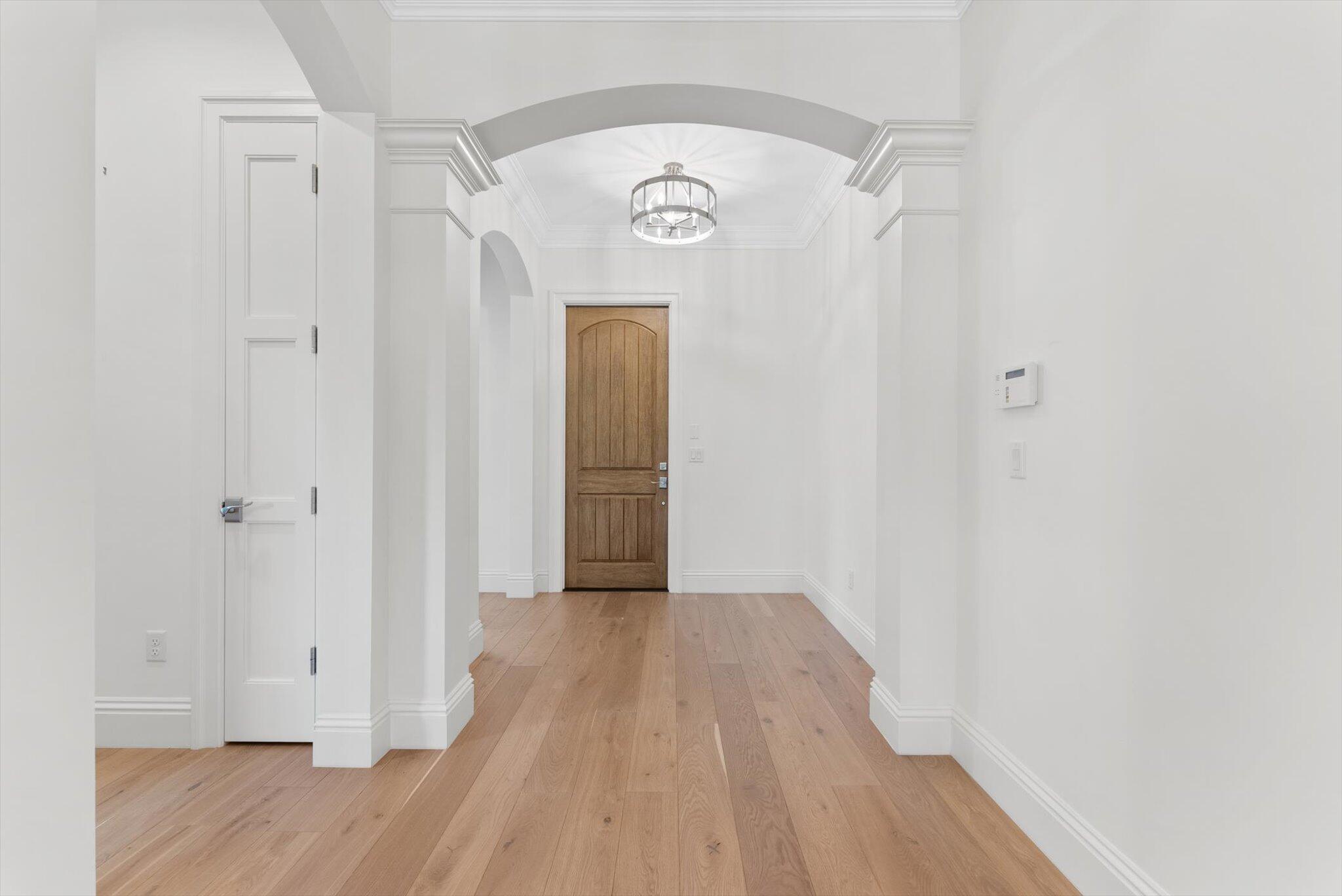 1301 Southwest 15th Street Boca Raton, FL 33486 - Photo 25 of 54 a view of a hallway with wooden floor