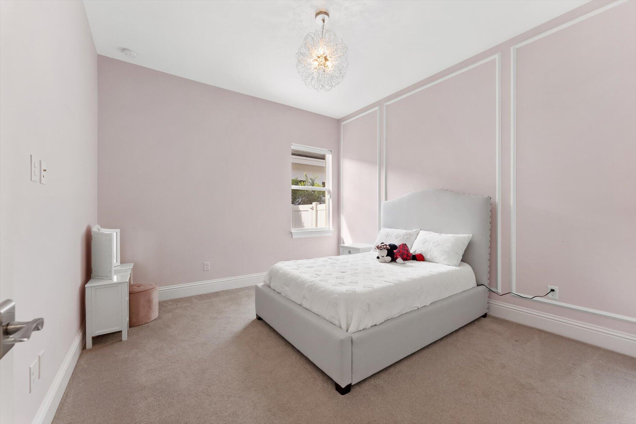 1301 Southwest 15th Street Boca Raton, FL 33486 - Photo 38 of 54 a bedroom with a bed and window