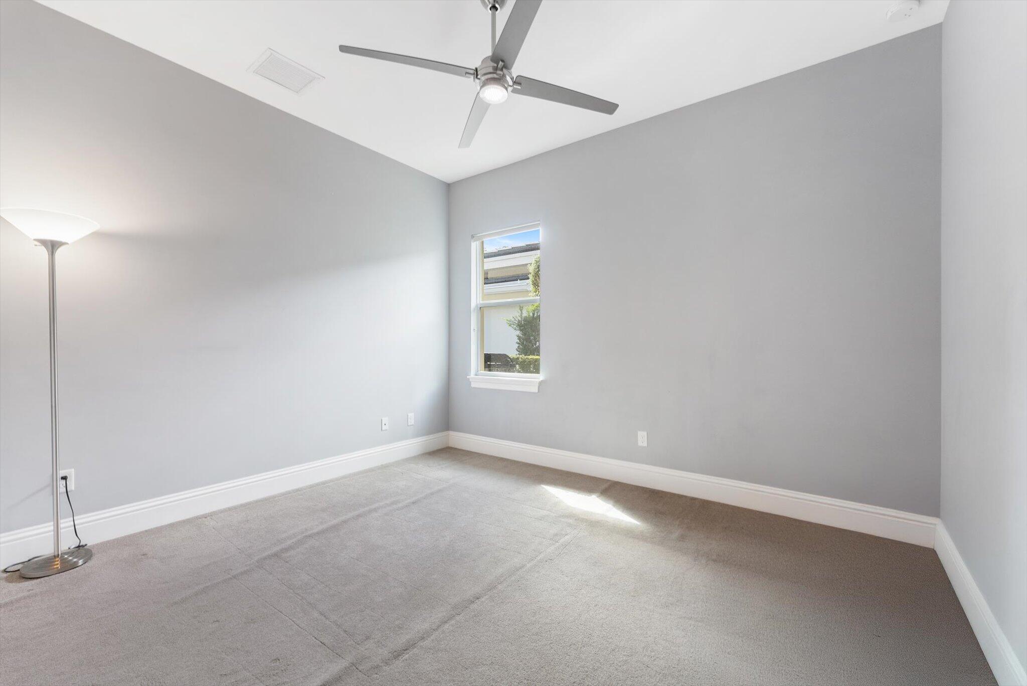 1301 Southwest 15th Street Boca Raton, FL 33486 - Photo 40 of 54 a view of an empty room with a window