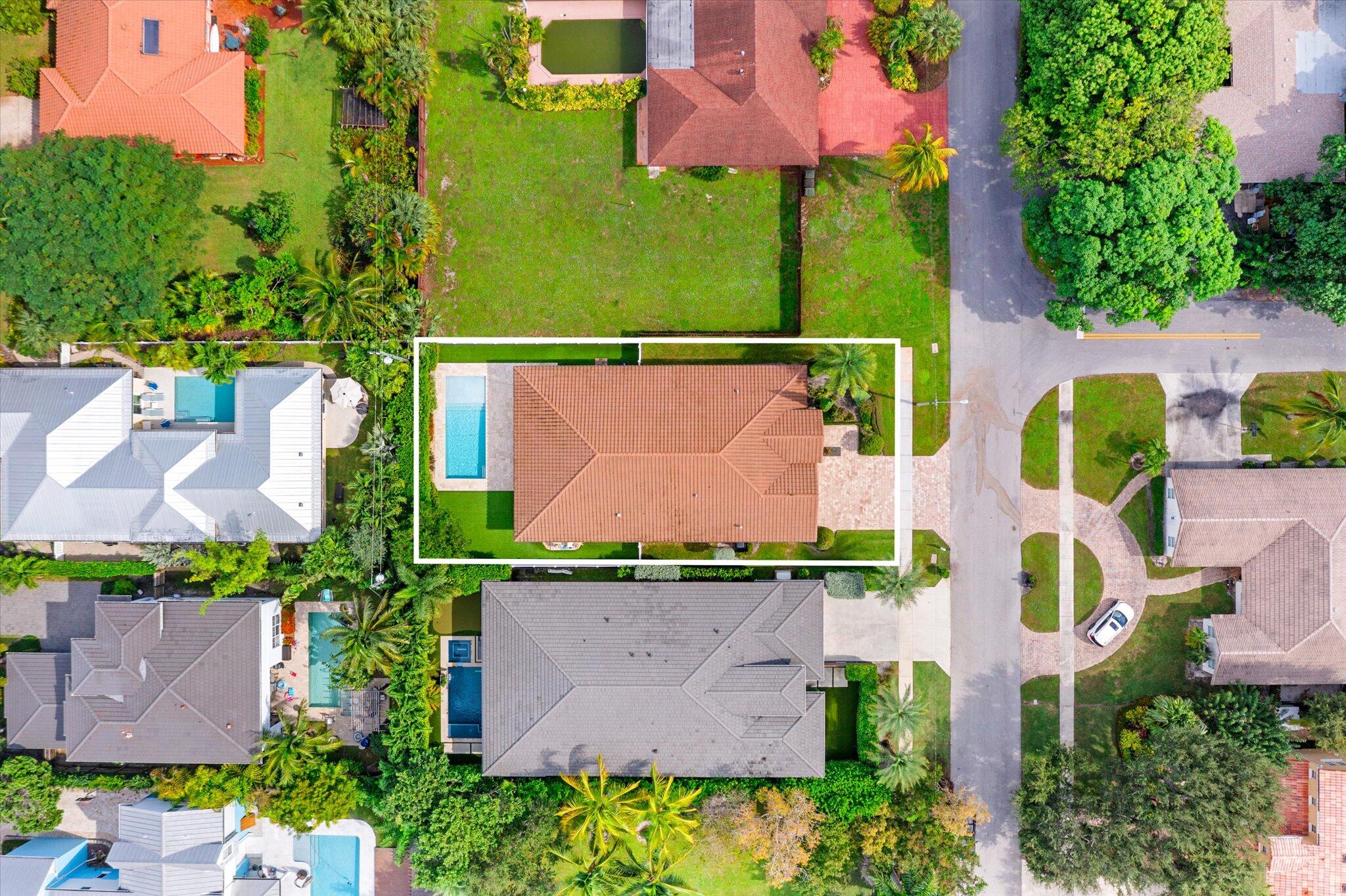 1301 Southwest 15th Street Boca Raton, FL 33486 - Photo 48 of 54 an aerial view of a house with an outdoor space and seating area