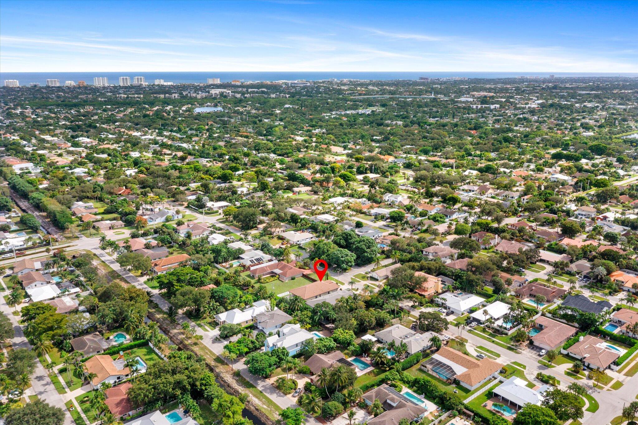 1301 Southwest 15th Street Boca Raton, FL 33486 - Photo 52 of 54 an aerial view of residential houses with city view