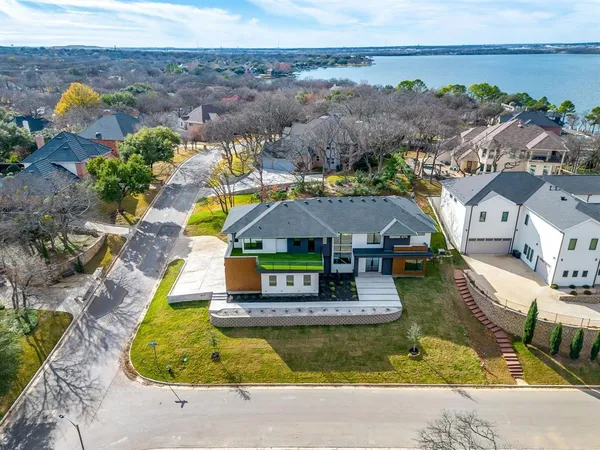 an aerial view of a house with swimming pool