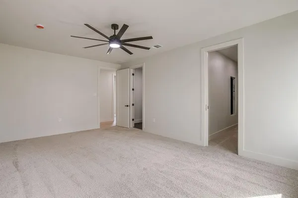 a view of a balcony with wooden floor