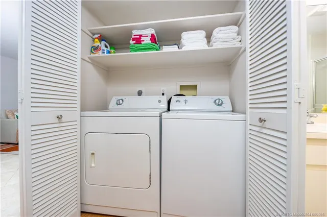 a utility room with dryer and washer