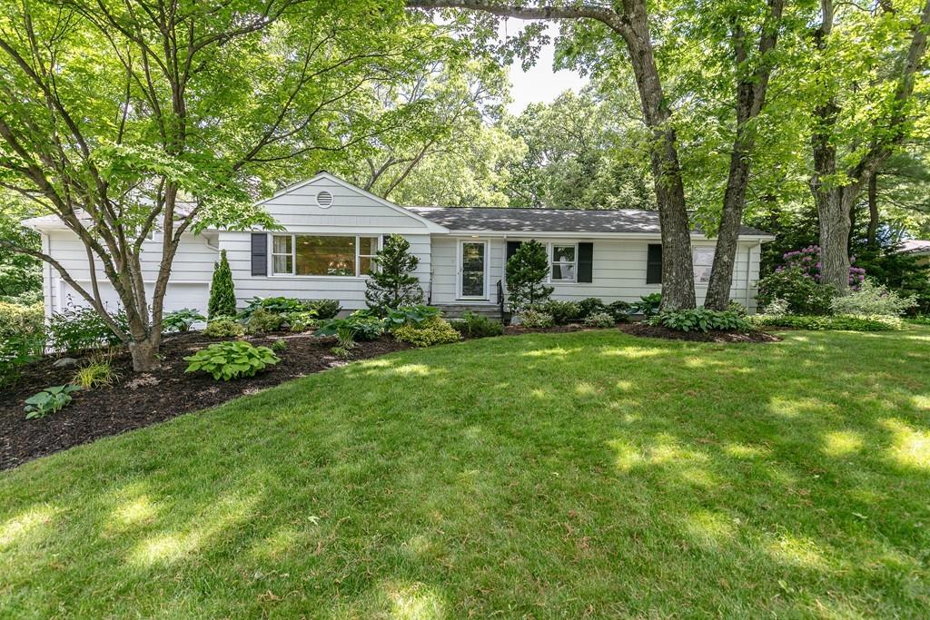 9 Baskin Road Lexington, MA 02421 - Photo 1 of 39 a front view of a house with garden