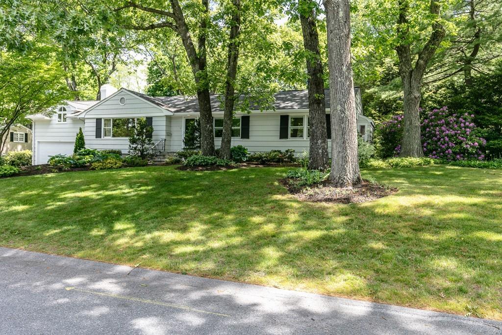 9 Baskin Road Lexington, MA 02421 - Photo 37 of 39 a front view of a house with garden