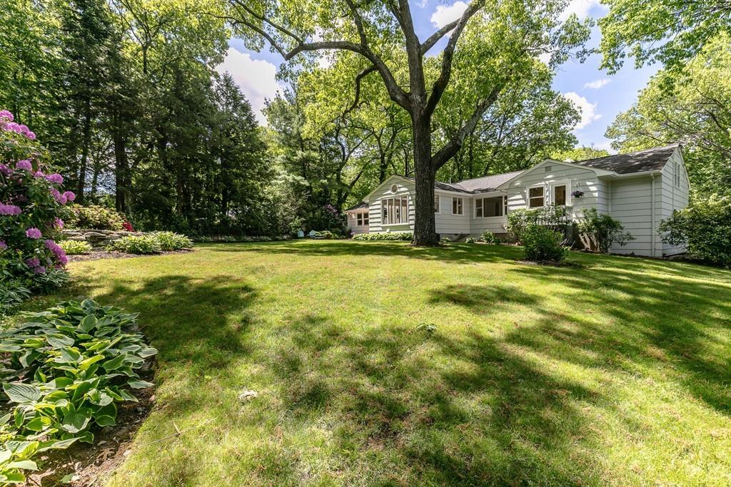 9 Baskin Road Lexington, MA 02421 - Photo 38 of 39 a view of a house with a big yard and large trees