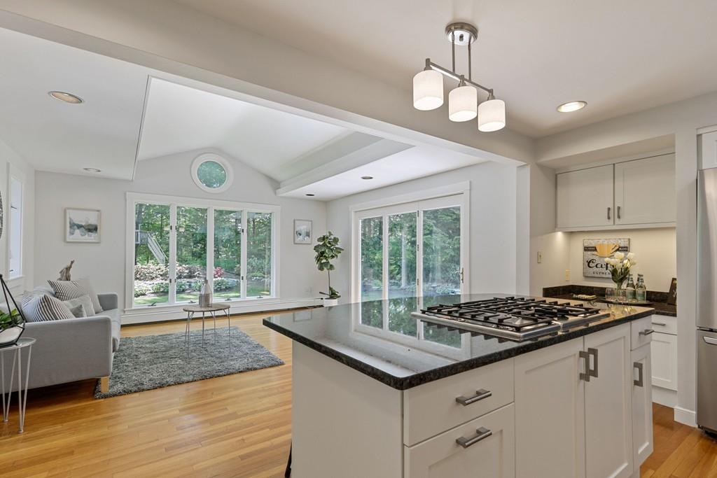 9 Baskin Road Lexington, MA 02421 - Photo 10 of 39 a kitchen with a stove and a large window
