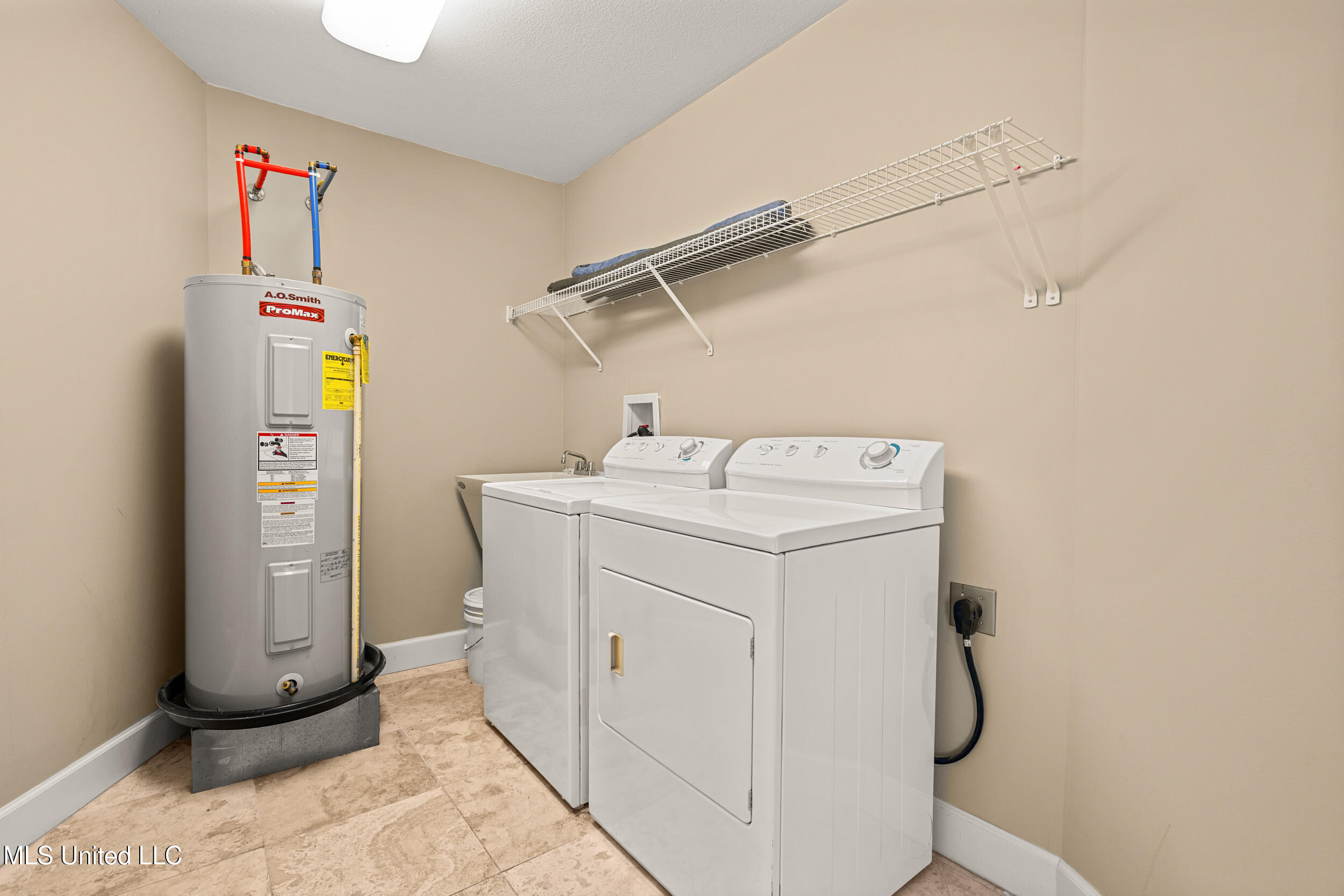 1899 Beach Boulevard, Unit 501 Biloxi, MS 39531 - Photo 44 of 60 44_laundry room