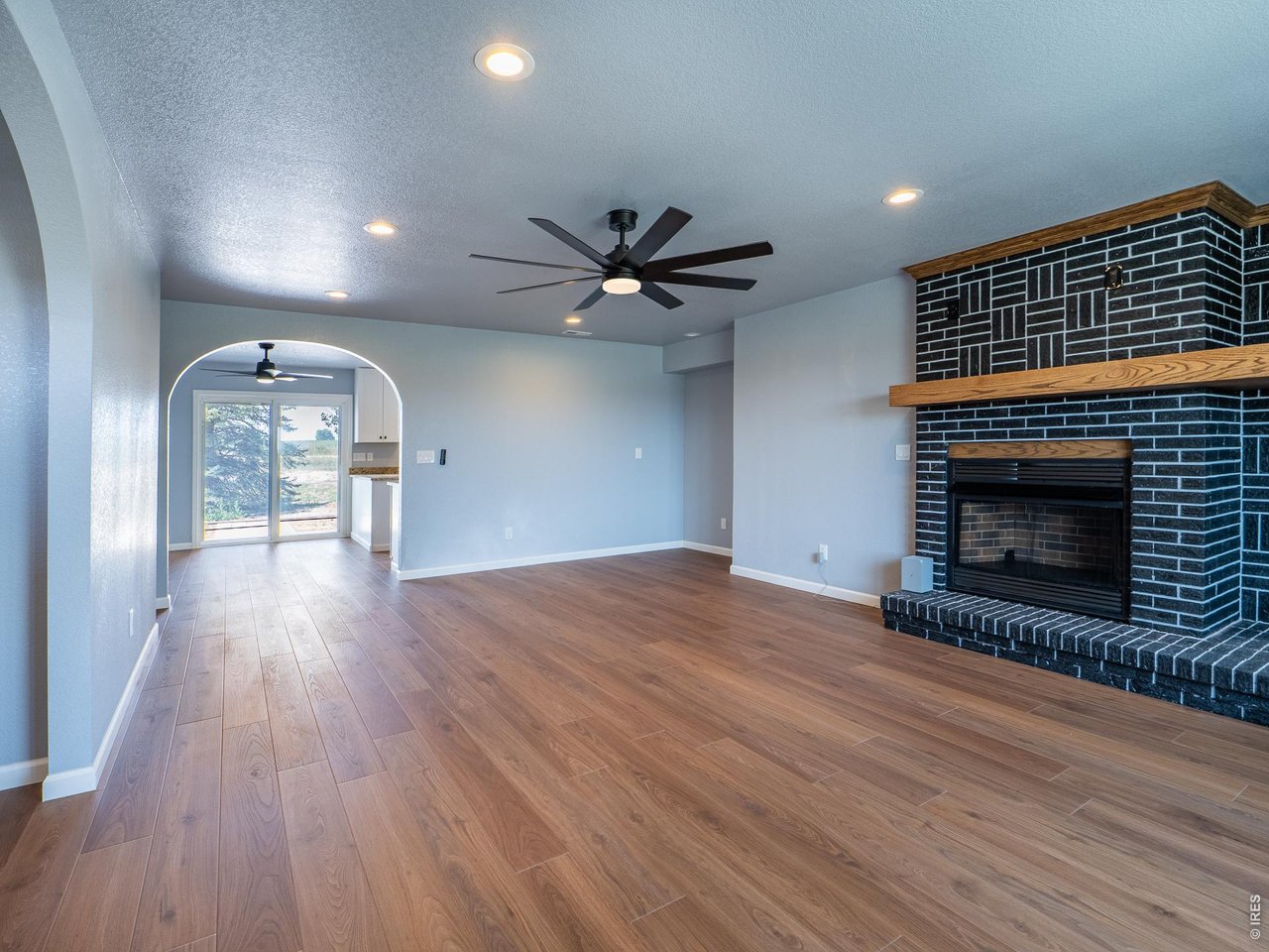36301 Appy Road Eaton, CO 80615 - Photo 2 of 36 Living room looking into kitchen