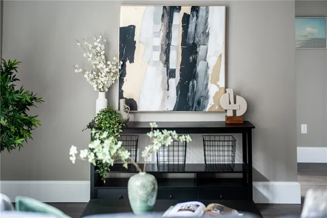 a bedroom with a bed and a lamp