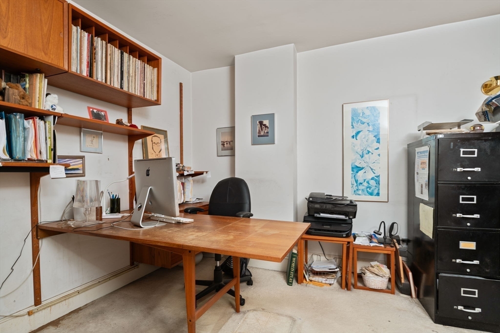 197 8th Street, Unit 728 Boston, MA 02129 - Photo 11 of 29 a view of a workspace with furniture
