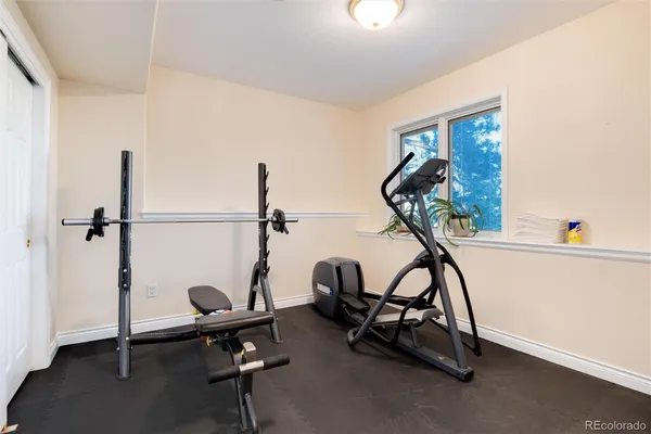 a view of a room with gym equipment