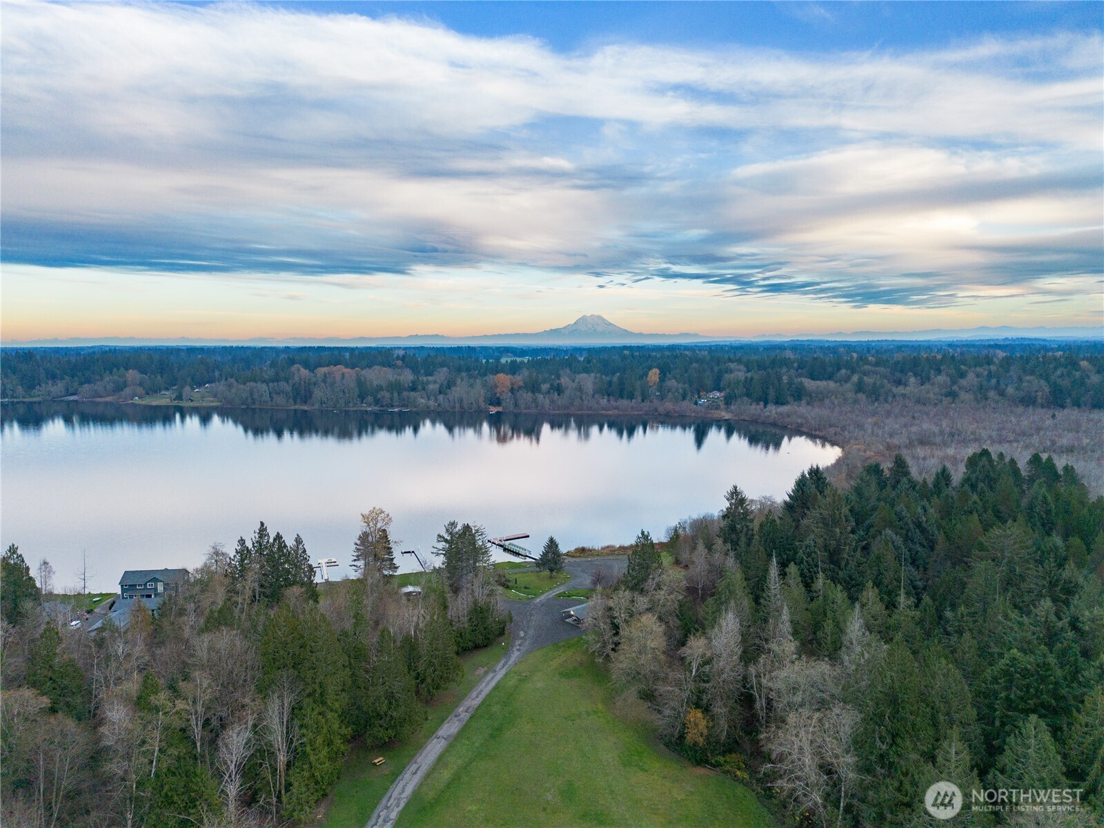 7609 Lakeside Street Southwest Olympia, WA 98512 - Photo 7 of 15 a view of a lake from a yard