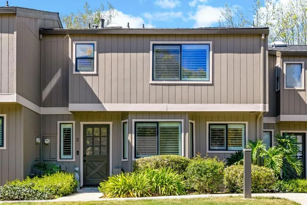 front view of a house with a small yard