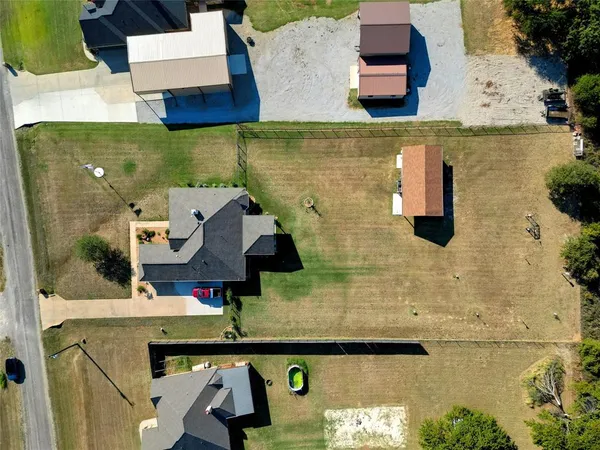a view of a swimming pool and lounge chair