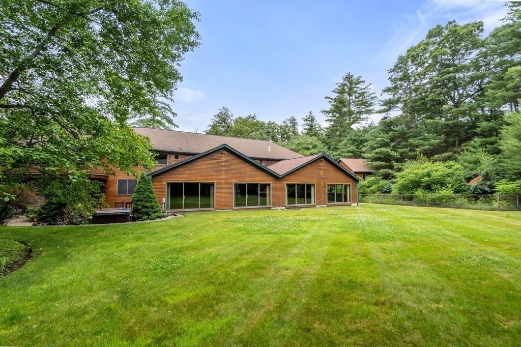 94 Topsfield Road Boxford, MA 01921 - Photo 33 of 40 a front of a house with a garden