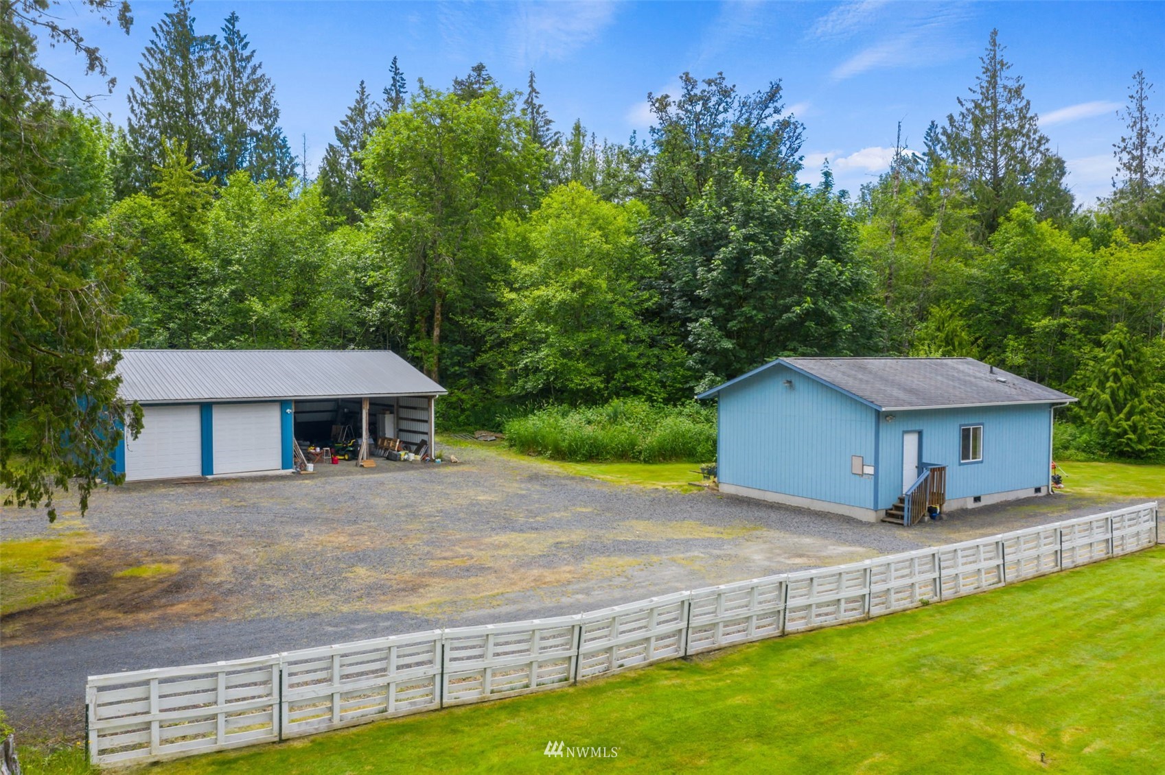 1153 Rush Road Chehalis, WA 98532 - Photo 4 of 30 a view of a house with a yard and sitting area