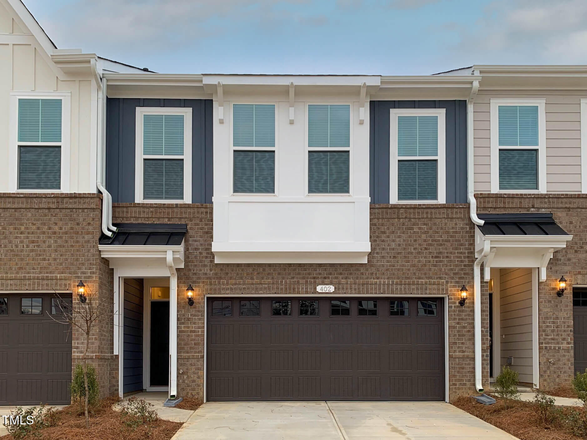 635 Cline Falls Drive, Unit HONEYSUCKLE Holly Springs, NC 27540 - Photo 11 of 23 a house view with a outdoor space