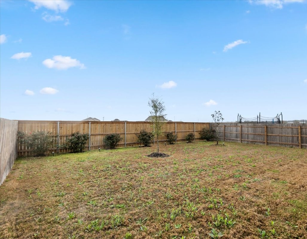 402 Perry Place Rockdale, TX 76567 - Photo 31 of 31 View of fenced backyard