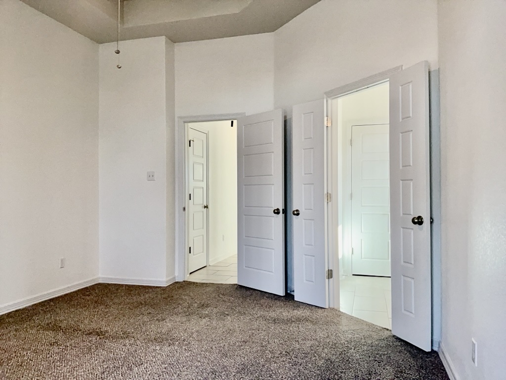18005 Pomelo Lane, Unit A Pflugerville, TX 78660 - Photo 12 of 28 a view of an empty room
