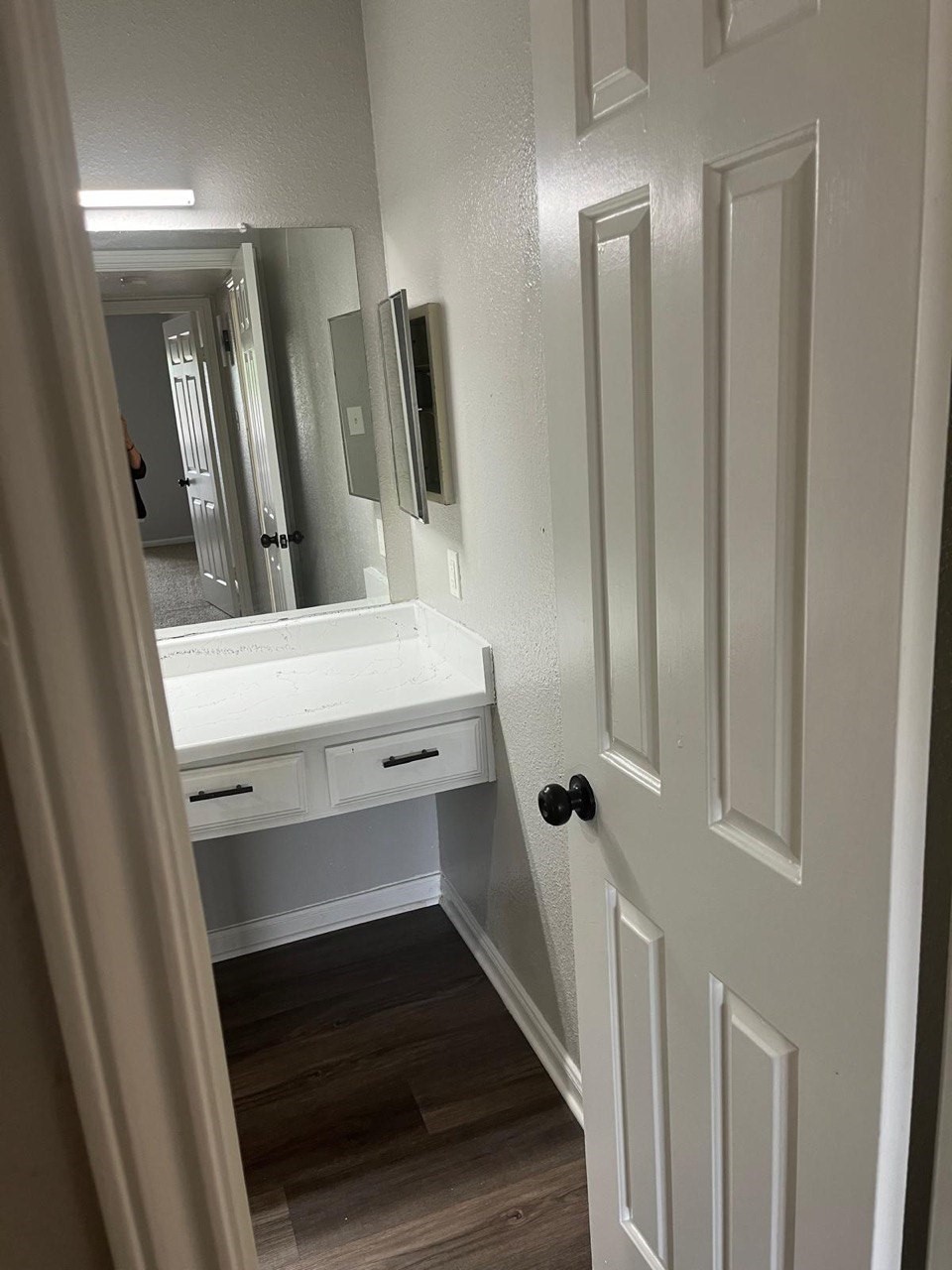 9255 West Sam Houston Parkway South, Unit 407 Houston, TX 77036 - Photo 3 of 10 a bathroom with a sink and mirror