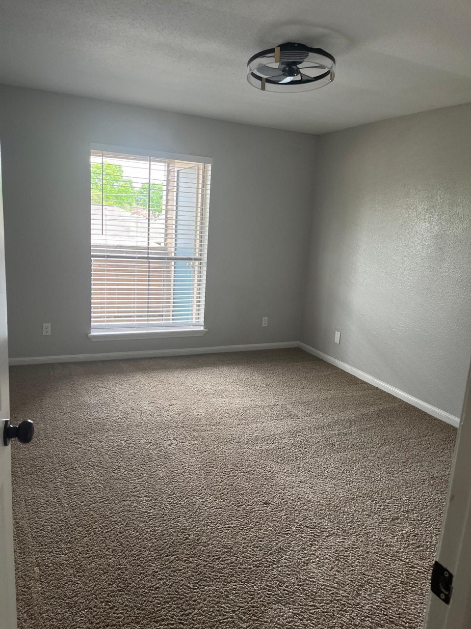 9255 West Sam Houston Parkway South, Unit 407 Houston, TX 77036 - Photo 9 of 10 an empty room with a window
