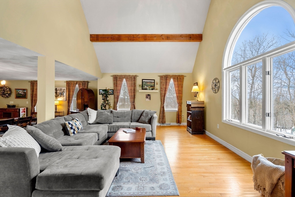 28 Coleman Road Groveland, MA 01834 - Photo 11 of 37 a living room with furniture and a large window