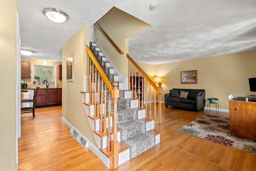 28 Coleman Road Groveland, MA 01834 - Photo 15 of 37 a view of livingroom with furniture and stairs