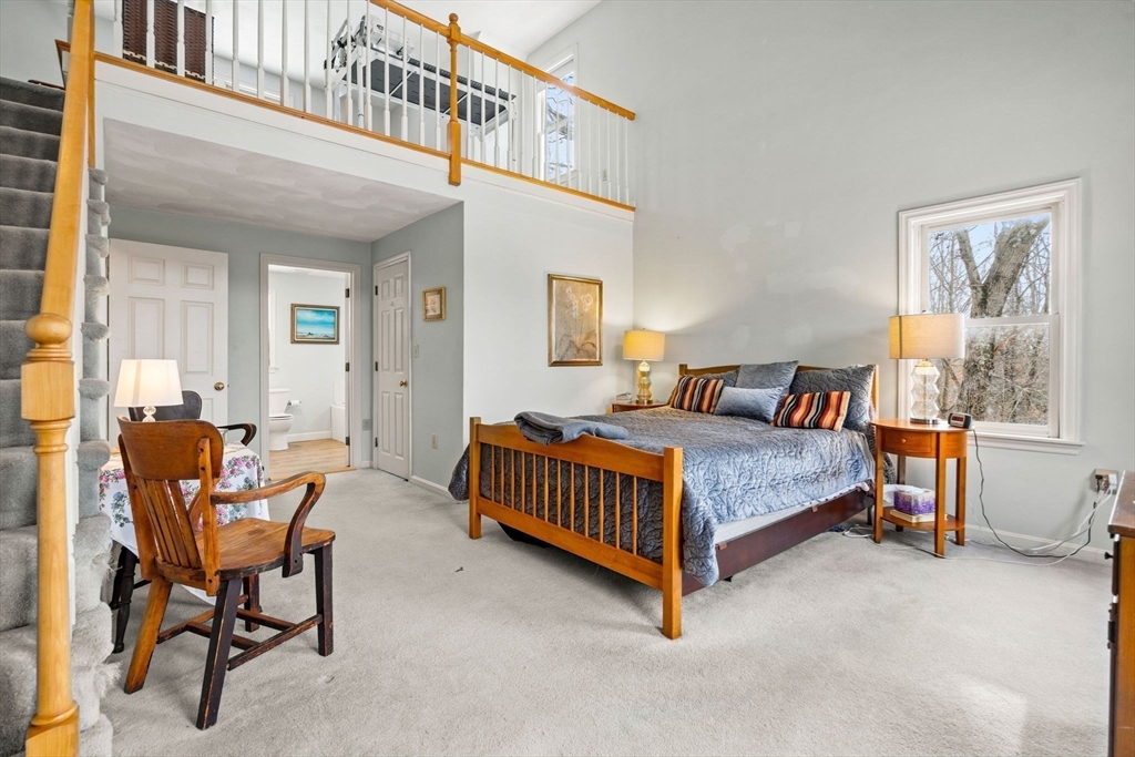 28 Coleman Road Groveland, MA 01834 - Photo 20 of 37 a bedroom with a bed chair and a window