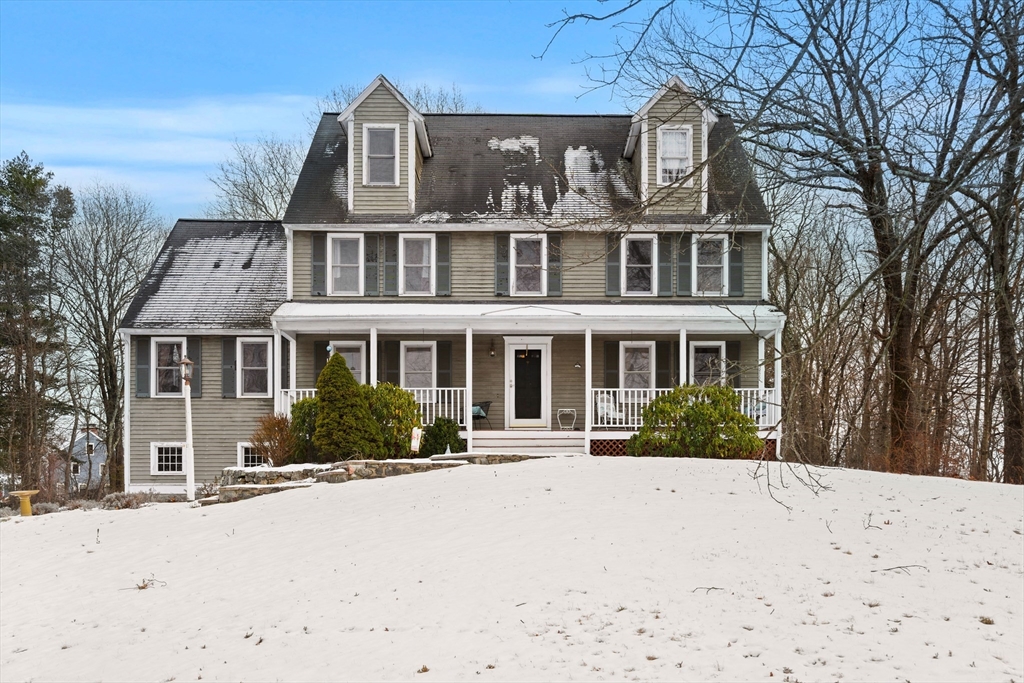 28 Coleman Road Groveland, MA 01834 - Photo 2 of 37 a front view of a house with a yard