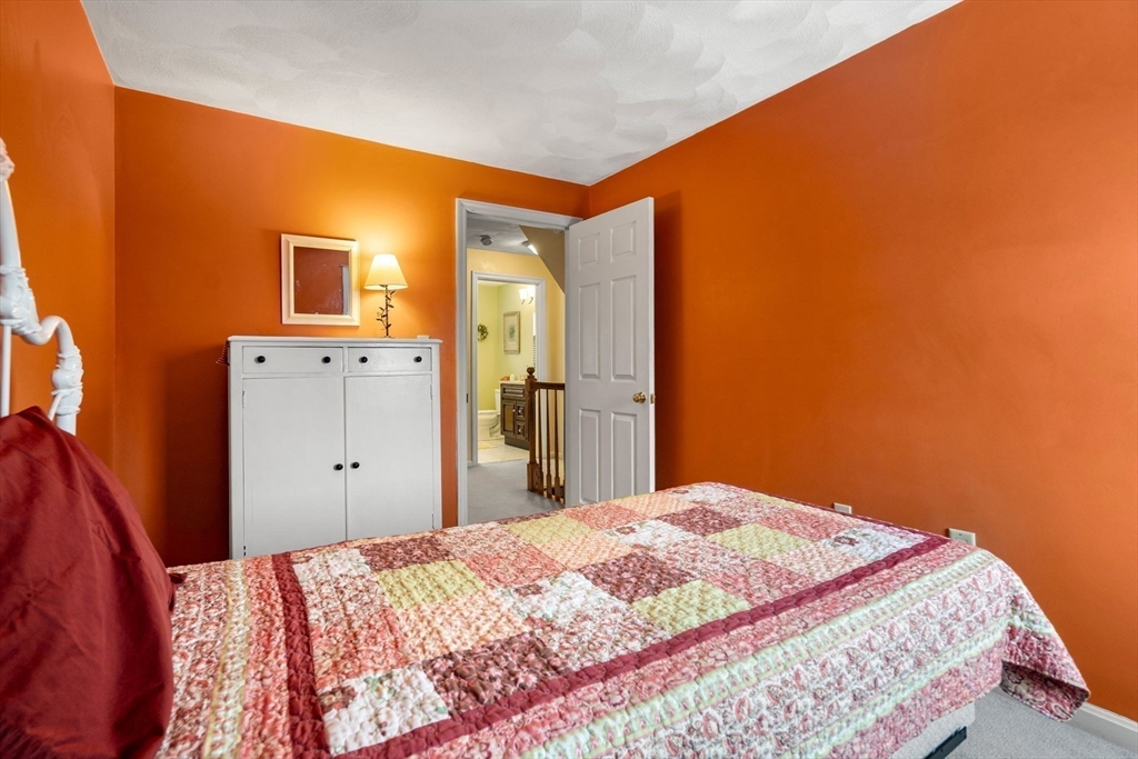 28 Coleman Road Groveland, MA 01834 - Photo 31 of 37 a bedroom with a bed and a dresser