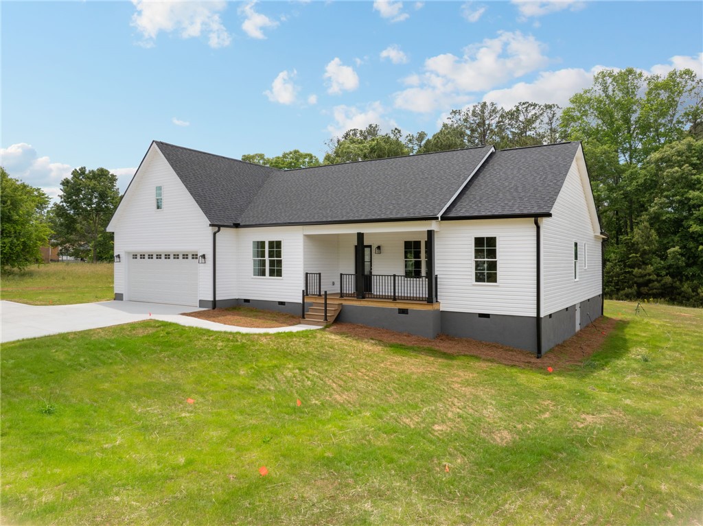 1735 Maw Bridge Road Central, SC 29630 - Photo 2 of 38 This charming home offers a perfect blend of comfort and style with its inviting porch.