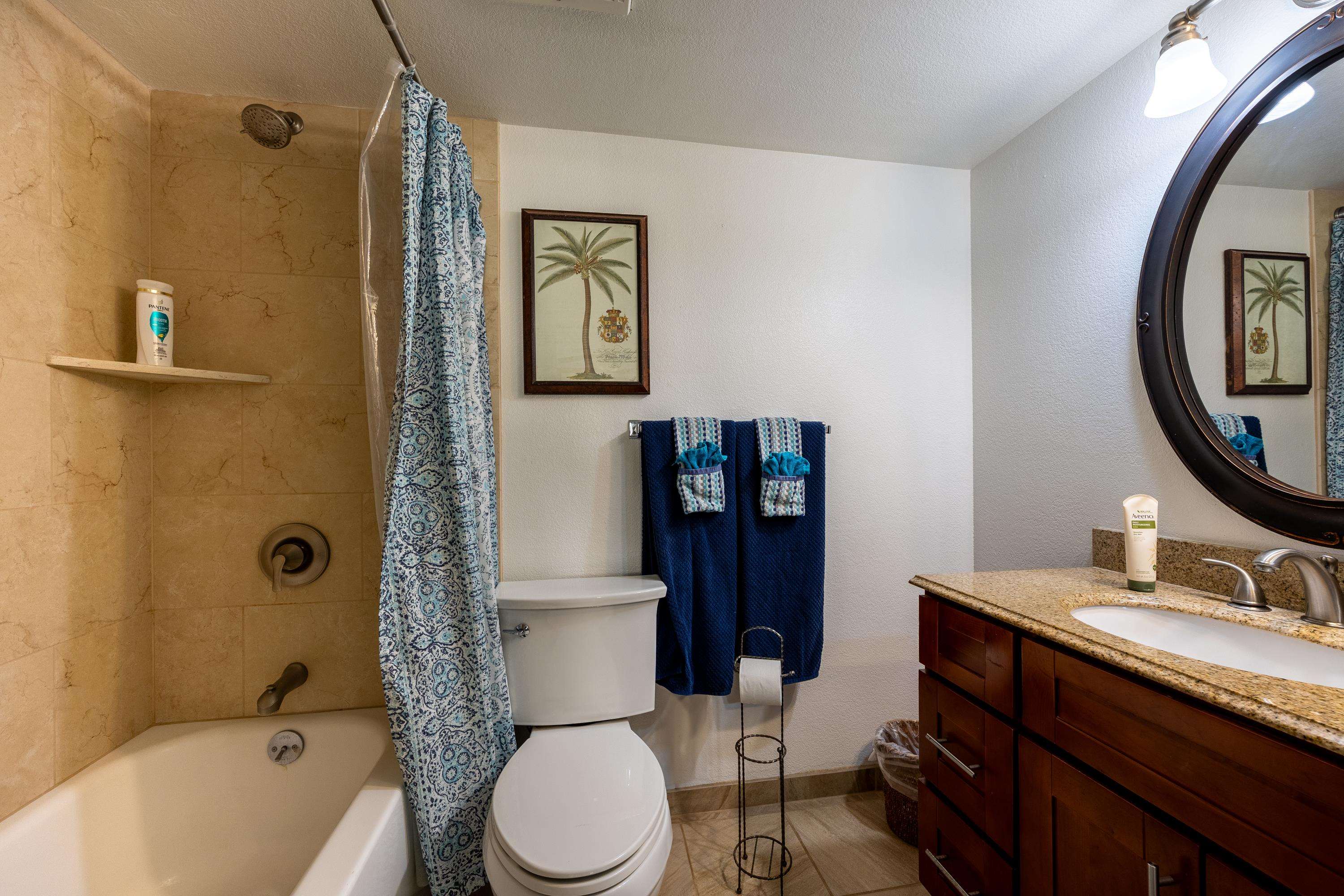 2695 South Kihei Road, Unit 9209 Kihei, HI 96753 - Photo 12 of 50 a bathroom with a sink toilet and shower