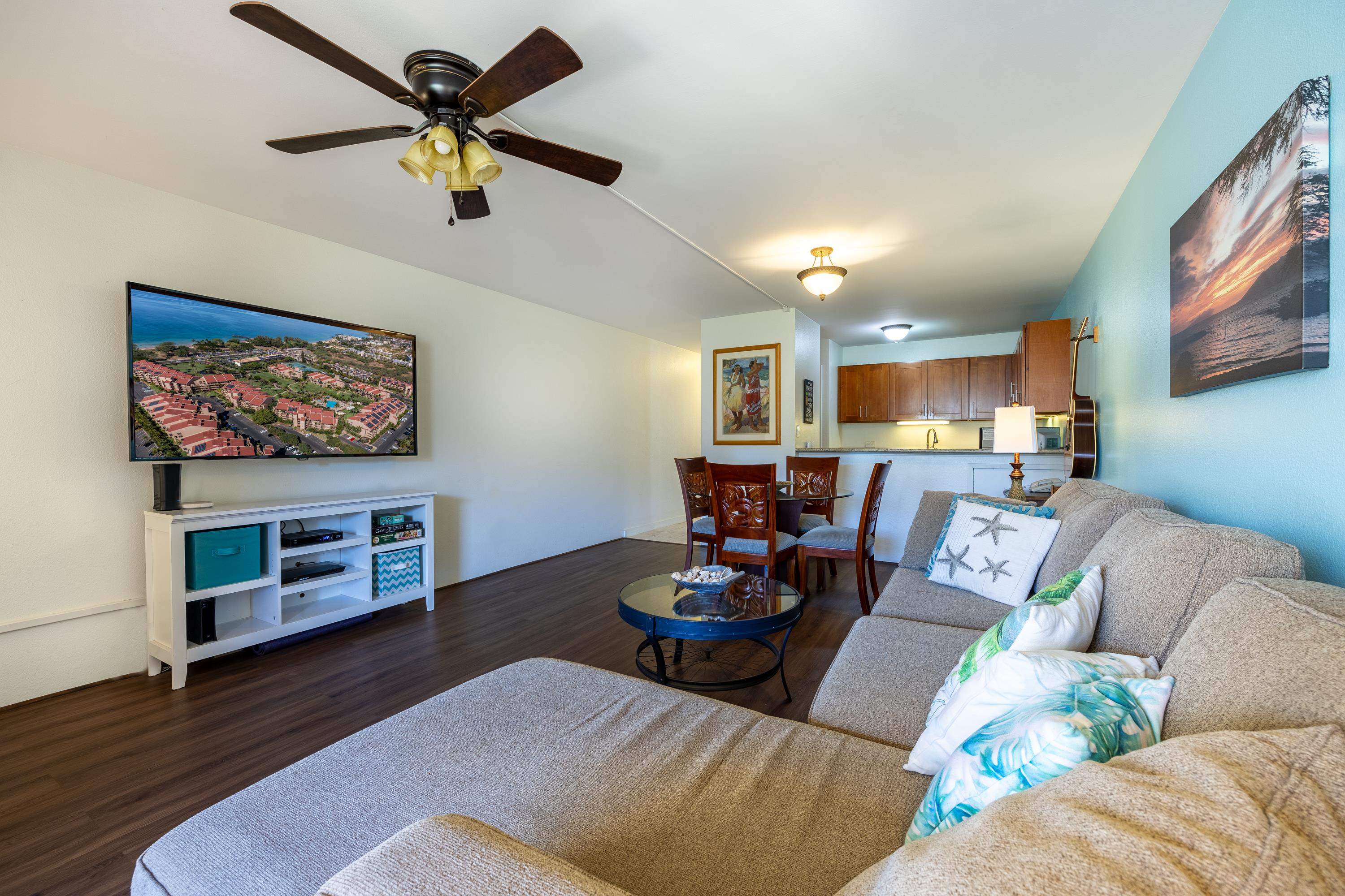 2695 South Kihei Road, Unit 9209 Kihei, HI 96753 - Photo 19 of 50 a living room with furniture and a flat screen tv