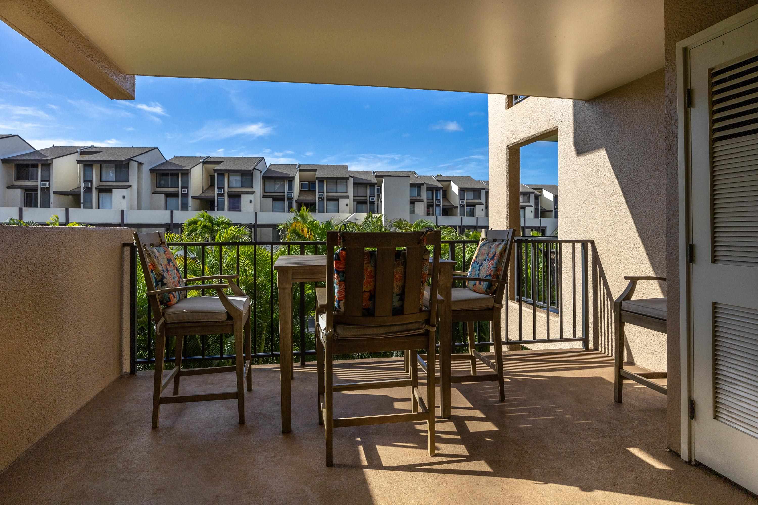 2695 South Kihei Road, Unit 9209 Kihei, HI 96753 - Photo 23 of 50 a view of a patio with table and chairs